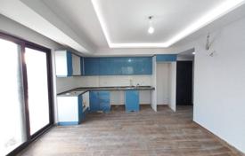 2 odalılar yeni binada daireler 60 m² Mugla'da, Türkiye. $72,000